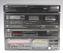 Four JVC hi-fi separates comprising a FX-333L tuner, a T-X900L tuner, a TD-W11X cassette deck and