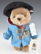 Steiff Paddington Bear Teddy bear with blue felt coat, black felt hat, medallion and label, 02199,