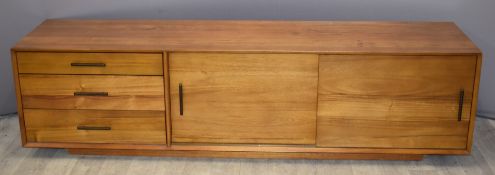 G Plan or similar sideboard with three drawers and sliding cupboard doors, W203 x D49 x H54cm