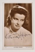 Katherine Hepburn autographed 14 x 9cm Metro Goldwyn Mayer publicity postcard signed in blue ink