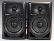 Pioneer DJ DM-40 active monitor speakers, manufactured July 2021.
