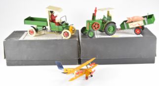 Three Tucher & Walther tinplate vehicles, all in original boxes.