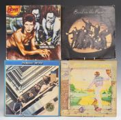 A collection of approximately 70 albums including David Bowie, The Beatles, Elton John, ELO,