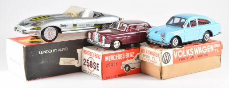 Three friction or clockwork powered tinplate toy cars comprising Jaguar E-Type Roadster, Mercedes-