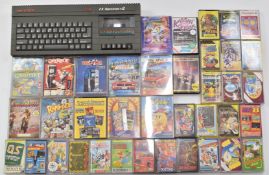 Sinclair ZX Spectrum +2 gaming computer with over 50 games including Gauntlet, Paperboy, Buggy