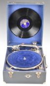 Wind-up picnic gramophone housed in a blue case.