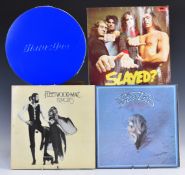 Approximately 50 albums plus singles