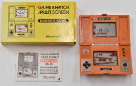 Nintendo Donkey Kong Multi Sctreen Game & Watch, DK-52, 1982, in original box with instructions.