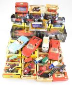 A collection of loose and boxed diecast model cars to include Burago, Lledo, Corgi, Shell Classico
