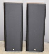 A pair of Klipsch Epic CF-4 walnut power speakers, fitted with dual 12