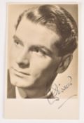 Laurence Olivier autographed 14 x 9cm postcard, signed to the lower right side in blue ink.