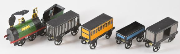 A painted metal model steam train kit comprising Locomotive, tender and four carriages,