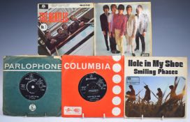 A collection of approximately 50 mostly 1960s singles including Bob Dylan, The Beatles, The Hollies,