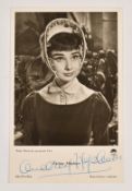 Audrey Hepburn autographed 14 x 9cm postcard from the film War & Peace, signed to the lower margin