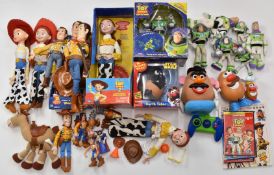 A large collection of Disney Pixar Toy Story action figures, some in original boxes and packaging.