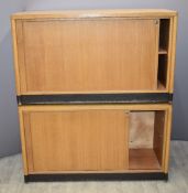 Two Gordon Russell of Broadway light oak tambour fronted cupboards, W120 x  D50 x H70cm