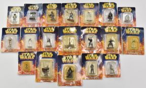 Twenty three Star Wars miniatures by DeAgostini together with a Kenner box set, collectible coins
