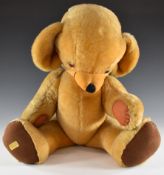Merrythought Cheeky Teddy bear with golden mohair, bells and jointed limbs, 60cm tall.