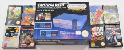 Nintendo NES retro gaming system in original box with 8 games including Super Mario Bros. Teenage