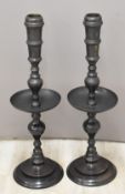 Pair of bronze or similar candlesticks, height 82cm