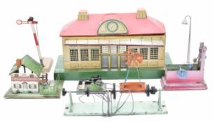 Tinplate station and various accessories to suit model railway or live steam engines, including