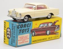 Corgi Toys diecast model Mercedes-Benz 220 SE Coupé with cream body, red interior and silver hubs,