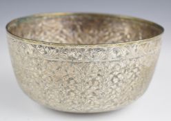 Burmese or similar silver bowl with embossed decoration including to the base, diameter 14.5cm,