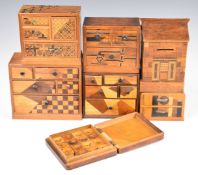 A collection of Japanese marquetry / parquetry boxes including a puzzle money box and a solitaire