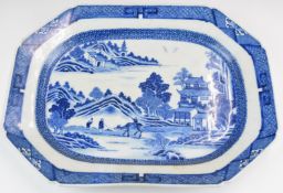 Chinese 19thC blue and white export octagonal plate decorated with a boy riding a buffalo, 32 x