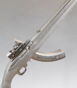 Ruger Model 10/22 .22 semi-automatic rifle with textured semi-pistol grip, composite stock, extended