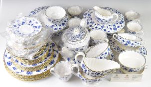 Spode dinner and tea ware decorated in the Blue Colonel pattern, approximately sixty pieces