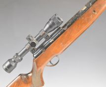 BSA Superstar .22 under-lever air rifle with chequered semi-pistol grip, raised cheek piece,