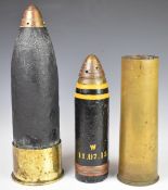 Three large military shells and shell cases, one filled with a large number of lead musket balls,
