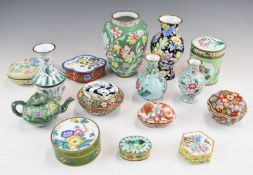 A collection of Indian, Chinese and Eastern enamelled vases, covered pots and miniature teapot,