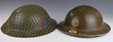 Two British Army 'Brodie' steel helmets, one stamped 1938 with liner and chin strap, the other a