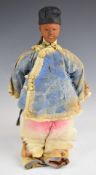 Chinese 'Door of Hope' girl doll wearing blue silk jacket, pink trousers, with bound feet and