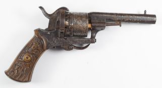 Belgian six-shot pinfire self-cocking revolver with ornately carved wooden grips, engraved frame and