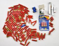 A collection of various shotgun cartridges including 12 bore, .410, flare pistol cartridges etc,