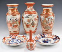 Four Japanese Kutani Imari vases and two plates, tallest 30cm