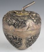 Chinese or similar silver novelty container formed as an apple, embossed with birds in foliage and