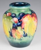 Moorcroft vase decorated in the Leaf and Berry pattern, height 9cm