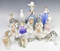 Fourteen Lladro / Nao, Royal Doulton and Coalport figurines, tallest 29cm