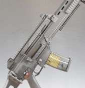 Heckler & Koch assault style electric airsoft rifle with folding tactical stock, adjustable