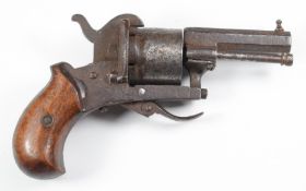 Belgian six-shot pinfire self-cocking revolver with shaped wooden grips, folding trigger and 2.25