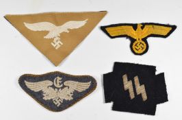 Four replica Nazi cloth badges