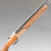 Lincoln 12 bore over and under ejector shotgun with engraved scenes of dogs and birds to the