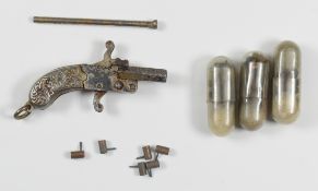 Austrian miniature pinfire hammer action pistol with engraved metal grip, ring loop and 0.5 inch