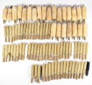 Approximately one hundred 12 bore and .410 shotgun cleaning mops.