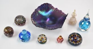 Nine pieces of coloured glassware comprising an Okra style iridescent glass bowl (23.5cm in