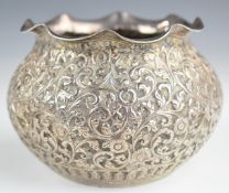 Burmese or similar silver bowl with embossed foliate decoration, diameter 11cm, weight 207g